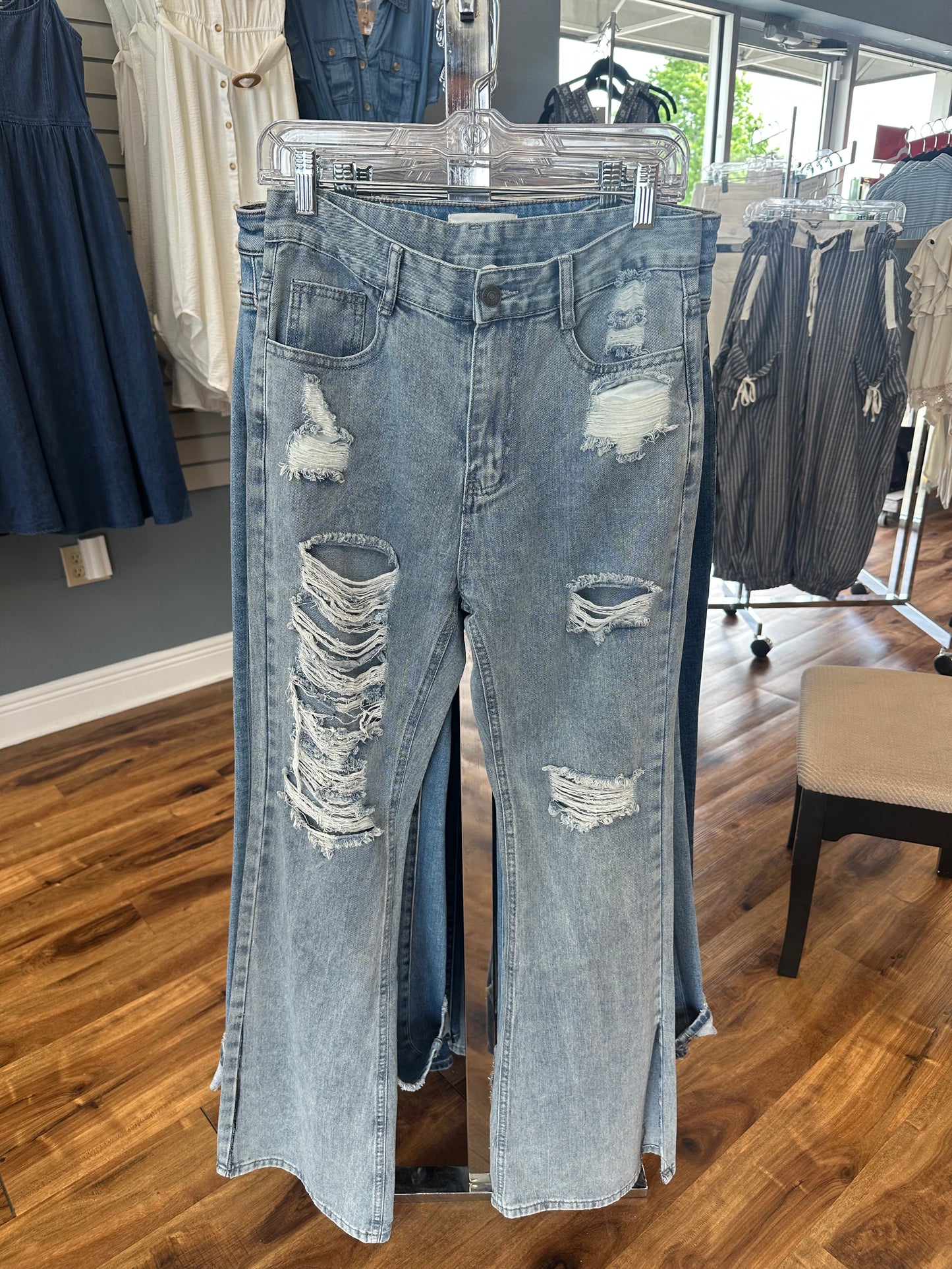 Distressed light wash split jean